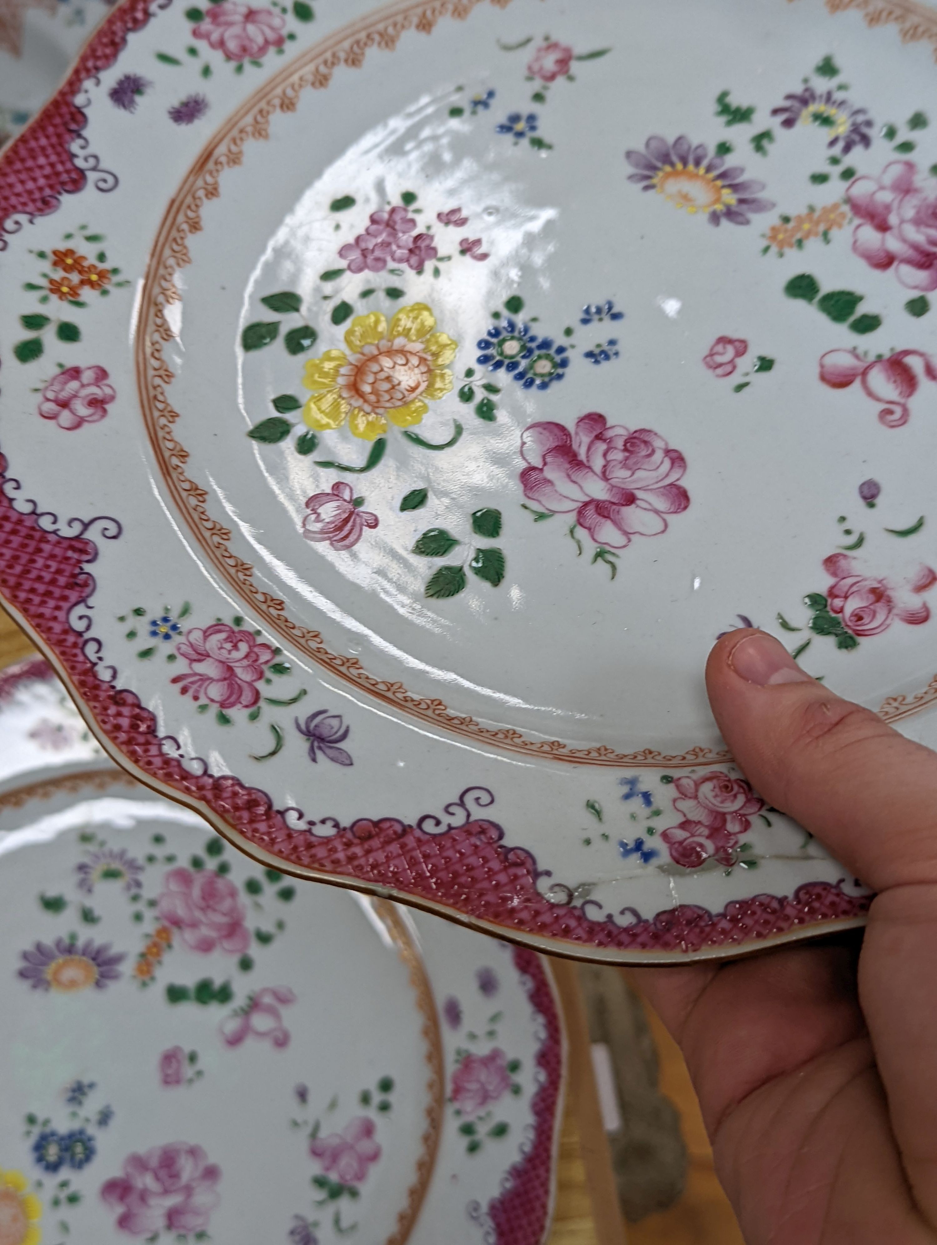 Two pairs of 18th century Chinese famille rose plates and an Imari plate, 26cm